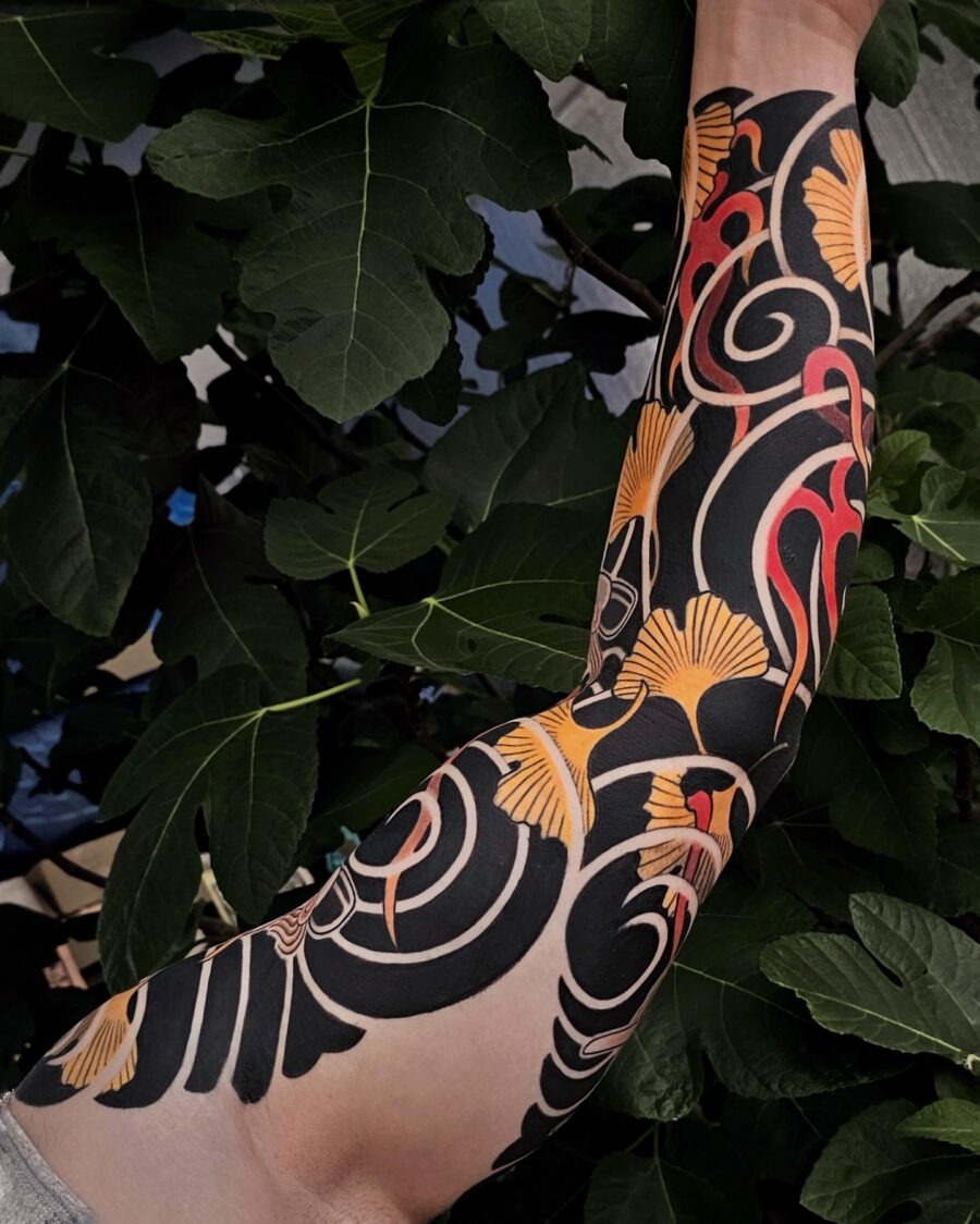 Vibrant Japanese Tattoo Sleeve with Nature Motifs Tattoo Design