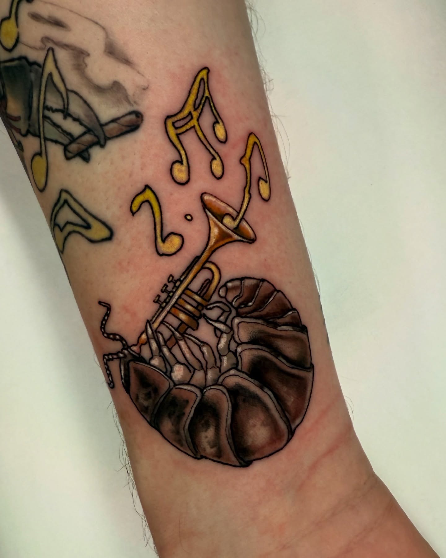 A unique blend of jazz and nature in ink Tattoo Design