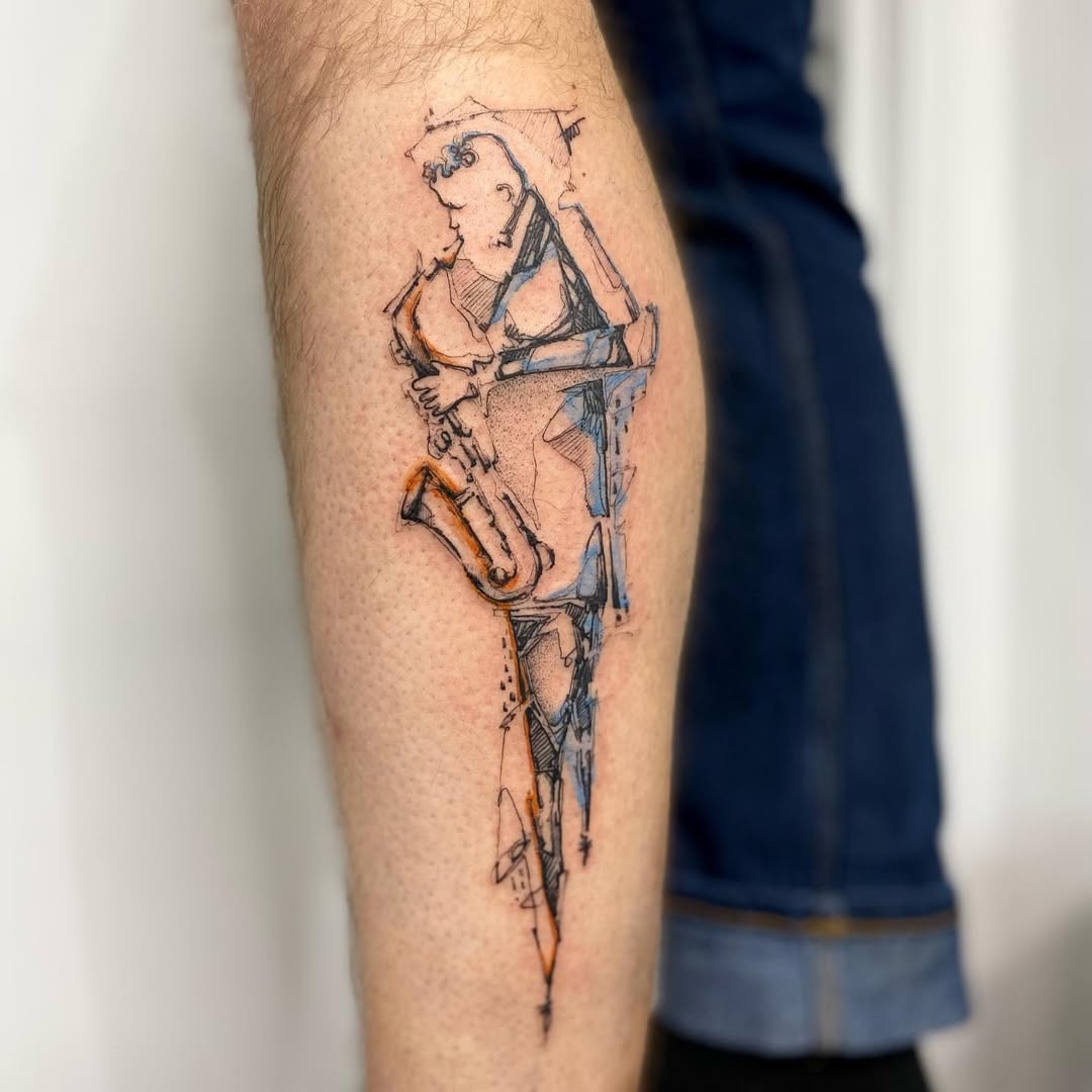 Artistic saxophonist tattoo in vibrant colors Tattoo Design