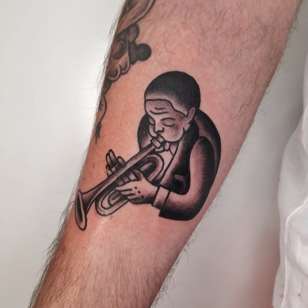 Classic jazz trumpet tattoo with elegant vibes Tattoo Design