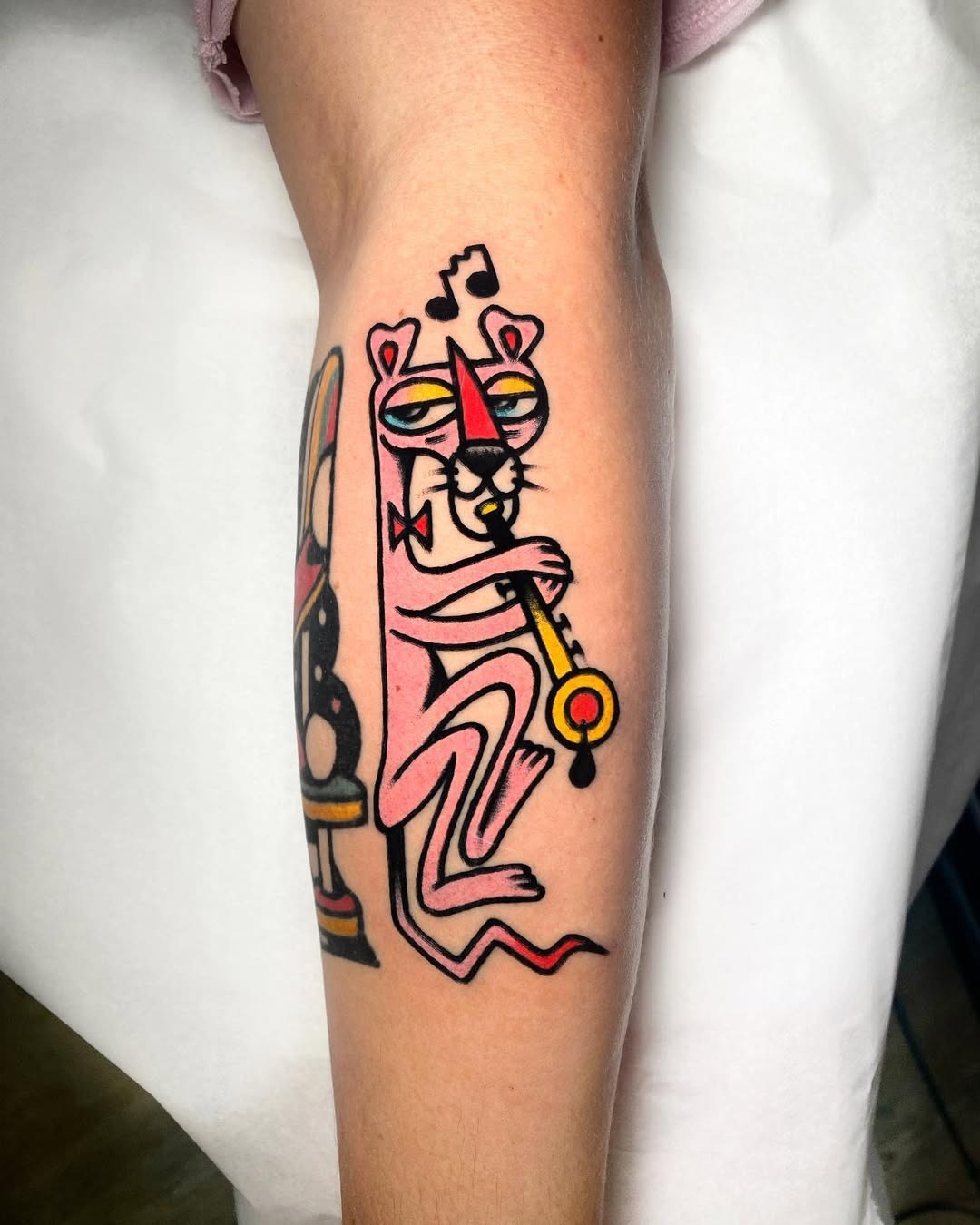 Colorful jazz tattoo with playful character Tattoo Design