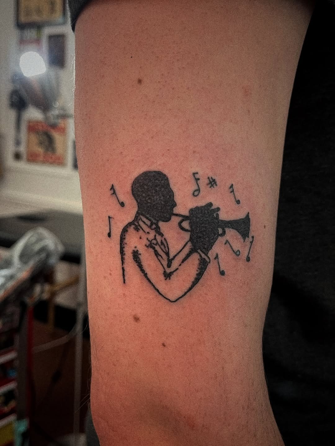Elegant jazz trumpet tattoo captures musical passion Tattoo Design