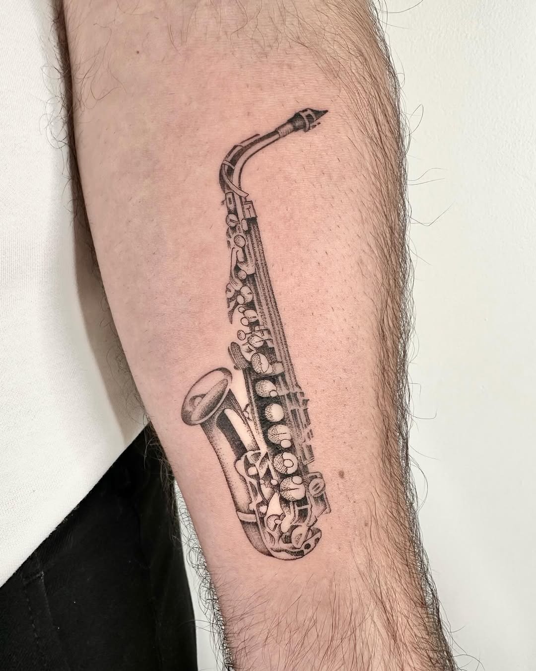 Stunning Saxophone Tattoo Celebrating Jazz Music Tattoo Design
