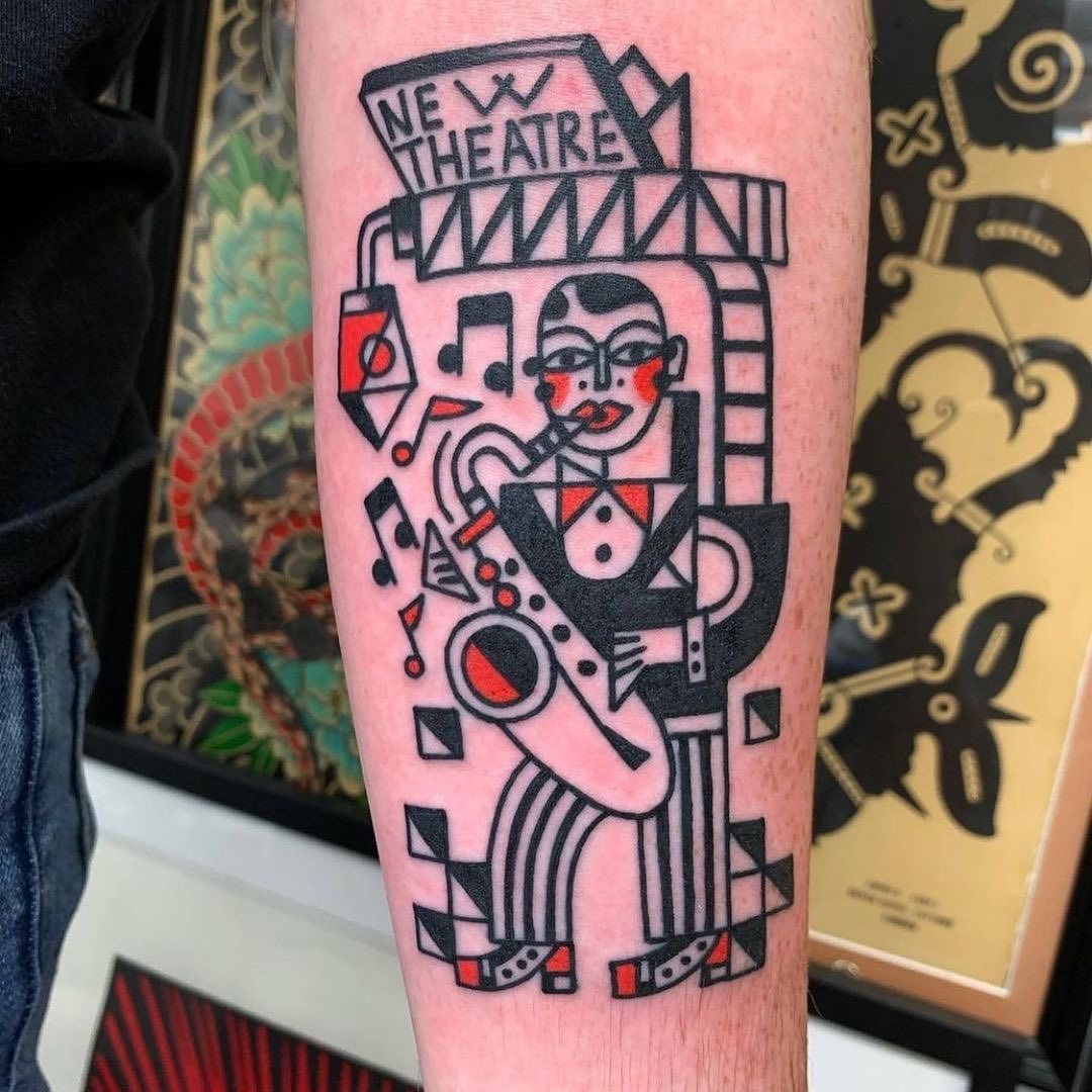Stylish Saxophonist Tattoo Reflecting Jazz Culture Tattoo Design