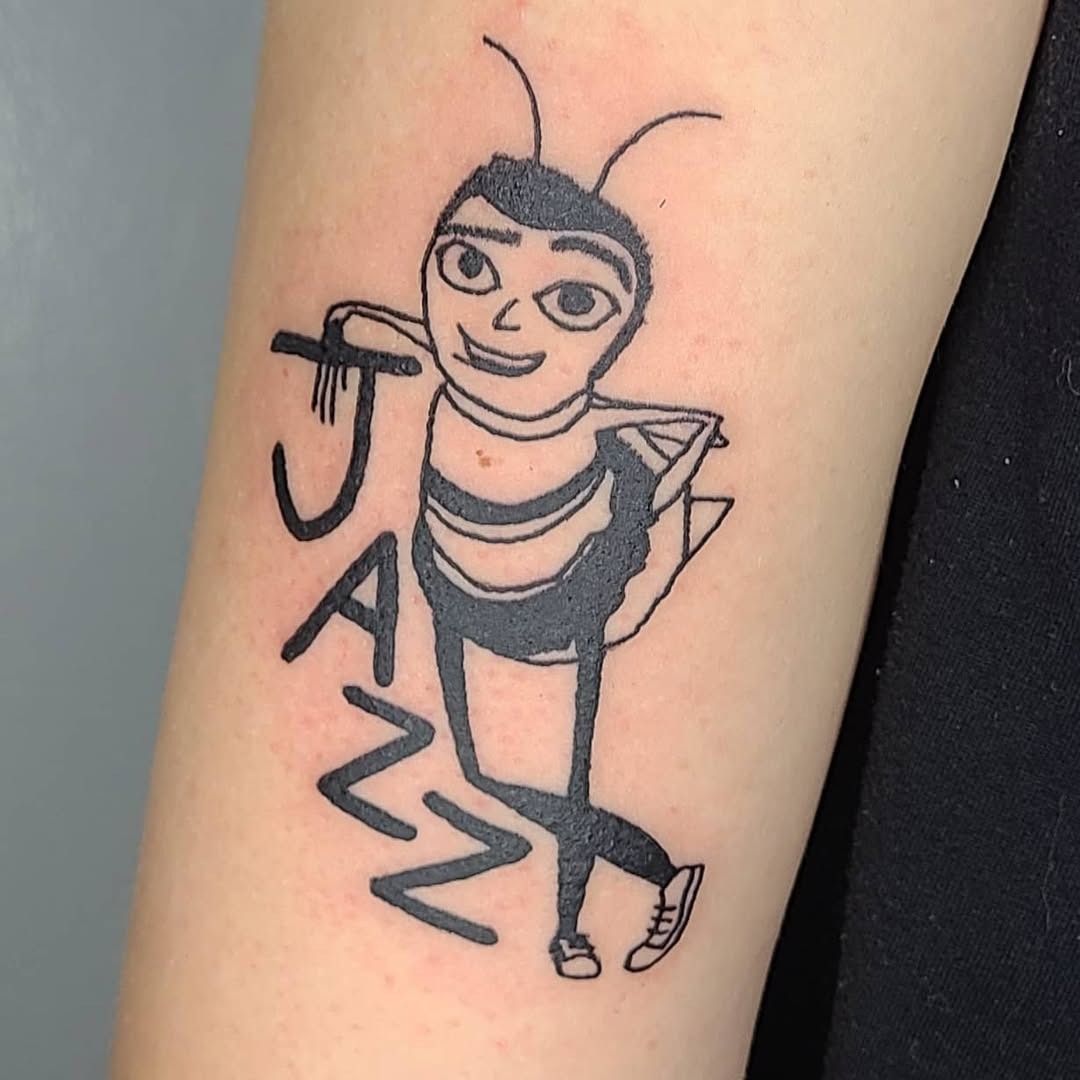 Unique jazz-themed bee character tattoo Tattoo Design