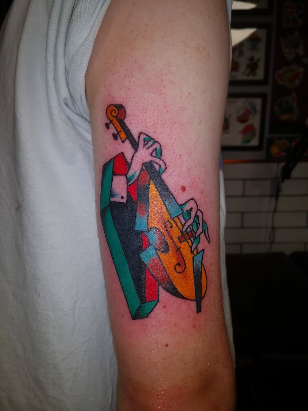 Vibrant jazz tattoo of a bassist Tattoo Design