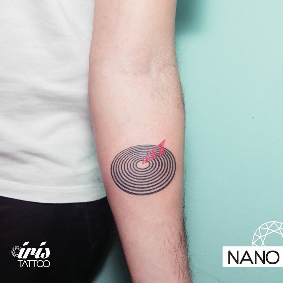 Vinyl Record Tattoo with Sound Waves Tattoo Design