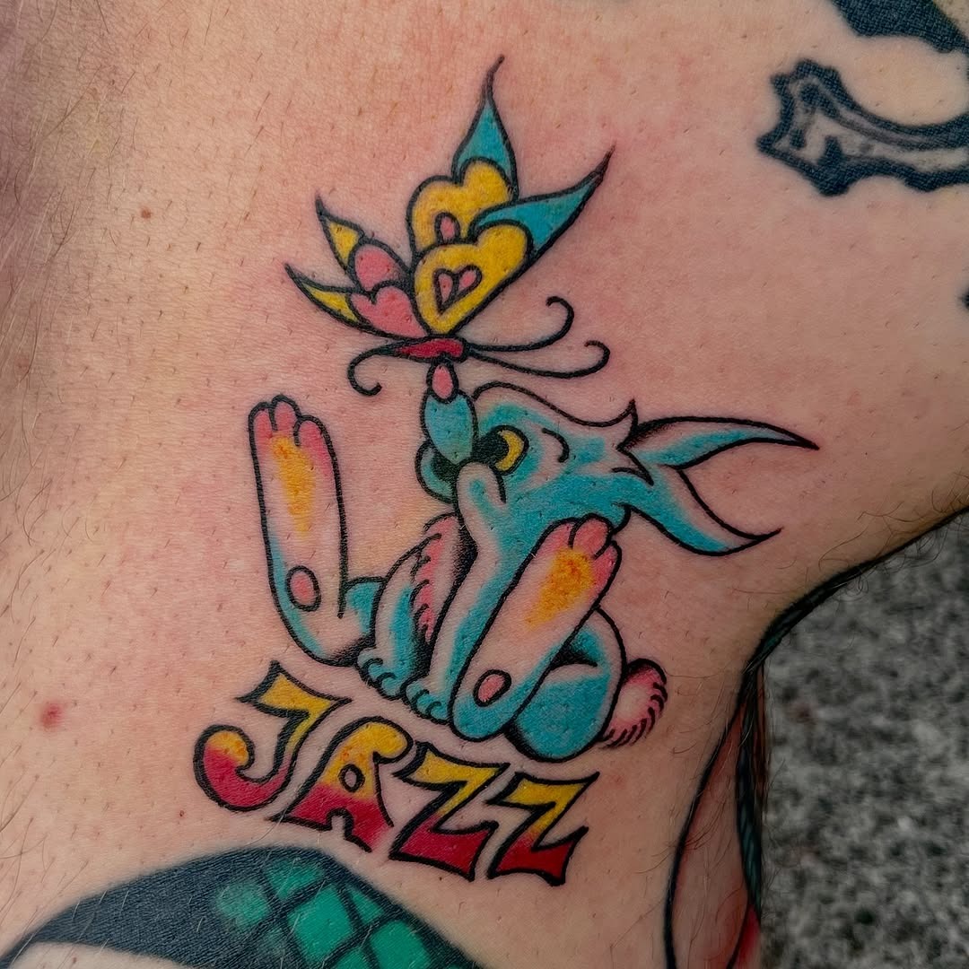 Whimsical Jazz Bunny with Butterfly Tattoo Tattoo Design