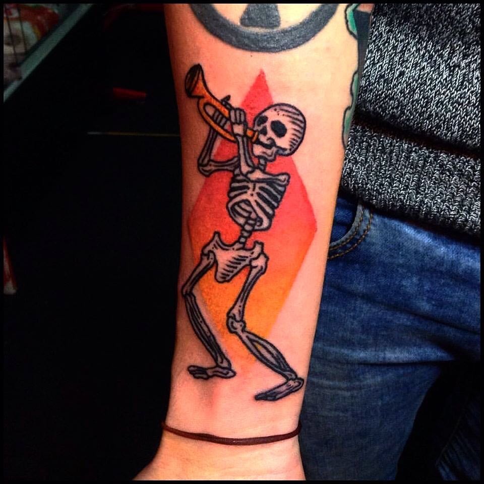 Whimsical jazz skeleton tattoo captures musical spirit Tattoo Design