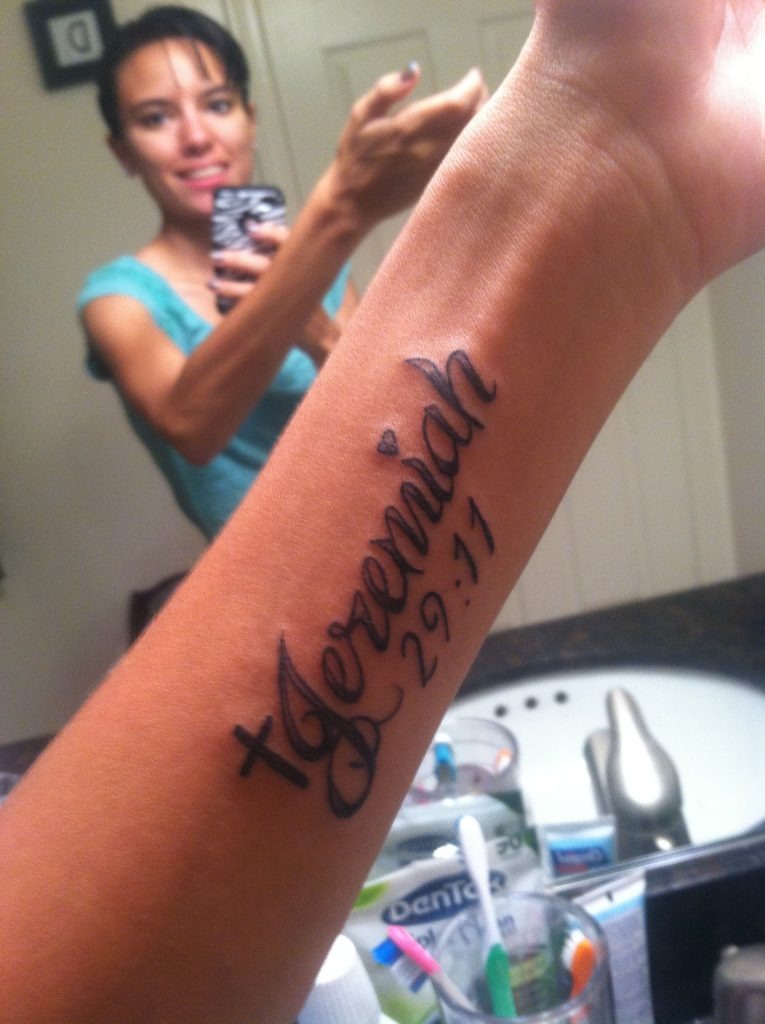 Feminine Cursive with a Cross Tattoo Design