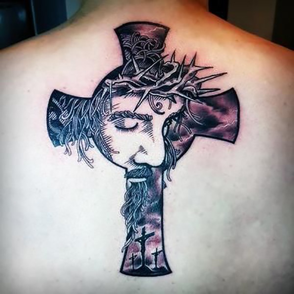 Celtic Cross Tattoo with a Portrait of Jesus and the Crosses of Calvary Tattoo Design