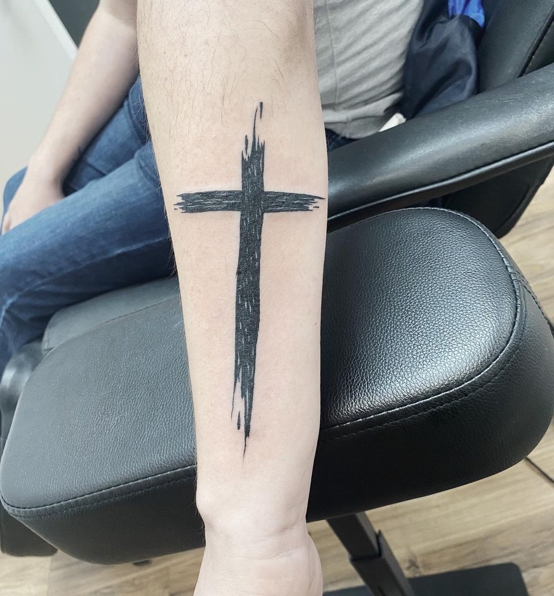 Rugged and Simple Faded Cross Tattoo Tattoo Design
