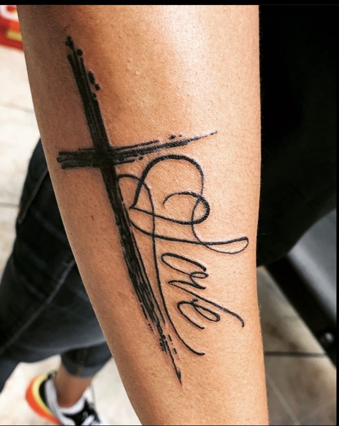 Rugged Cross Tattoo with Cursive “Love” Letters Tattoo Design