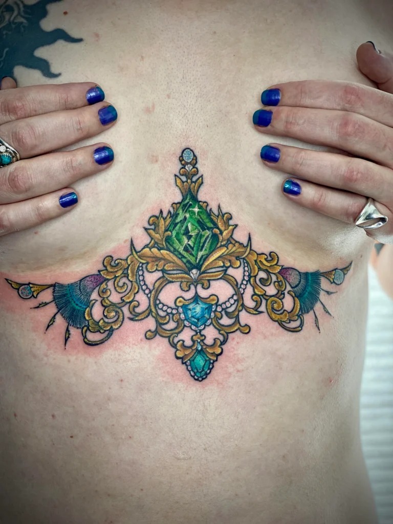 Ornamental Emerald Sternum Tattoo Tattoo Design