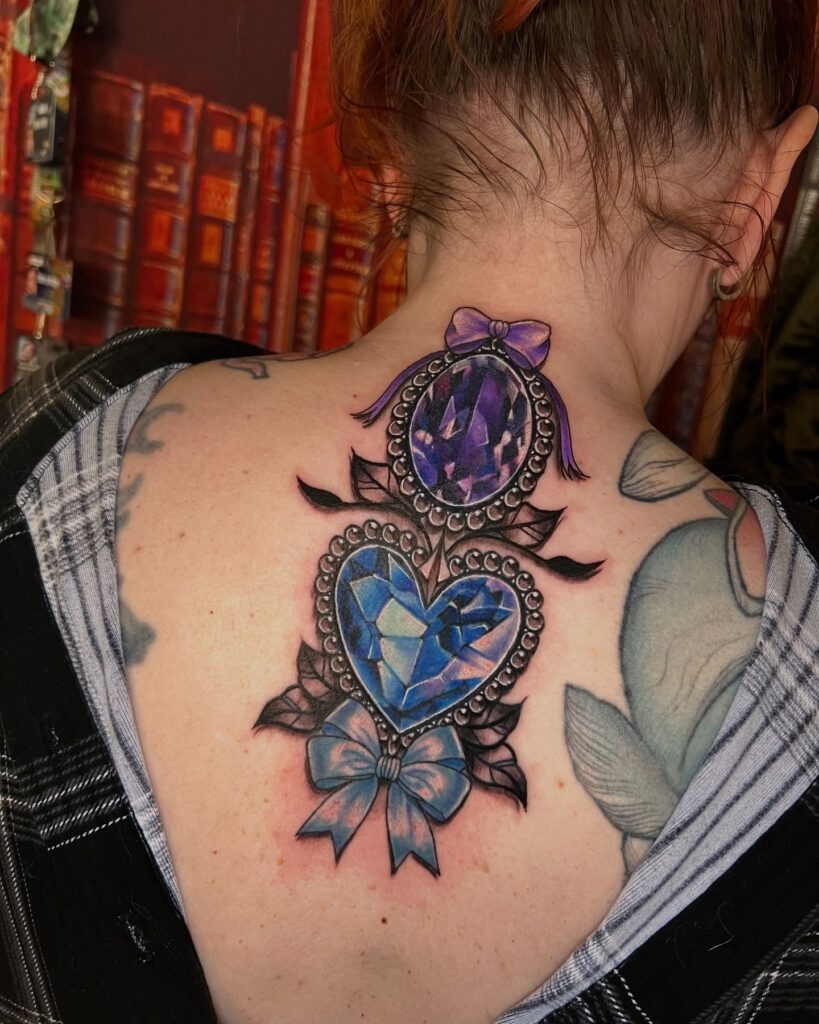 Twin Jewel Cameo Tattoo with Bows and Leaves Tattoo Design