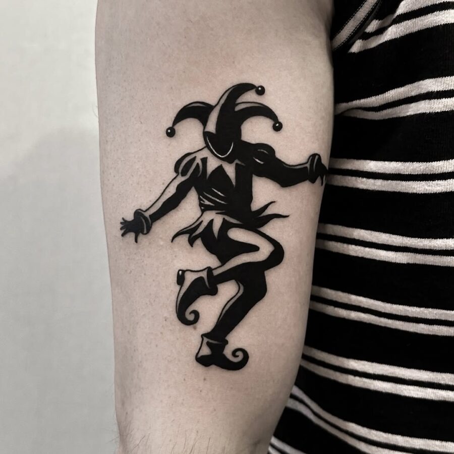 Classic Joker Jester Tattoo in Bold Black Tattoo Design