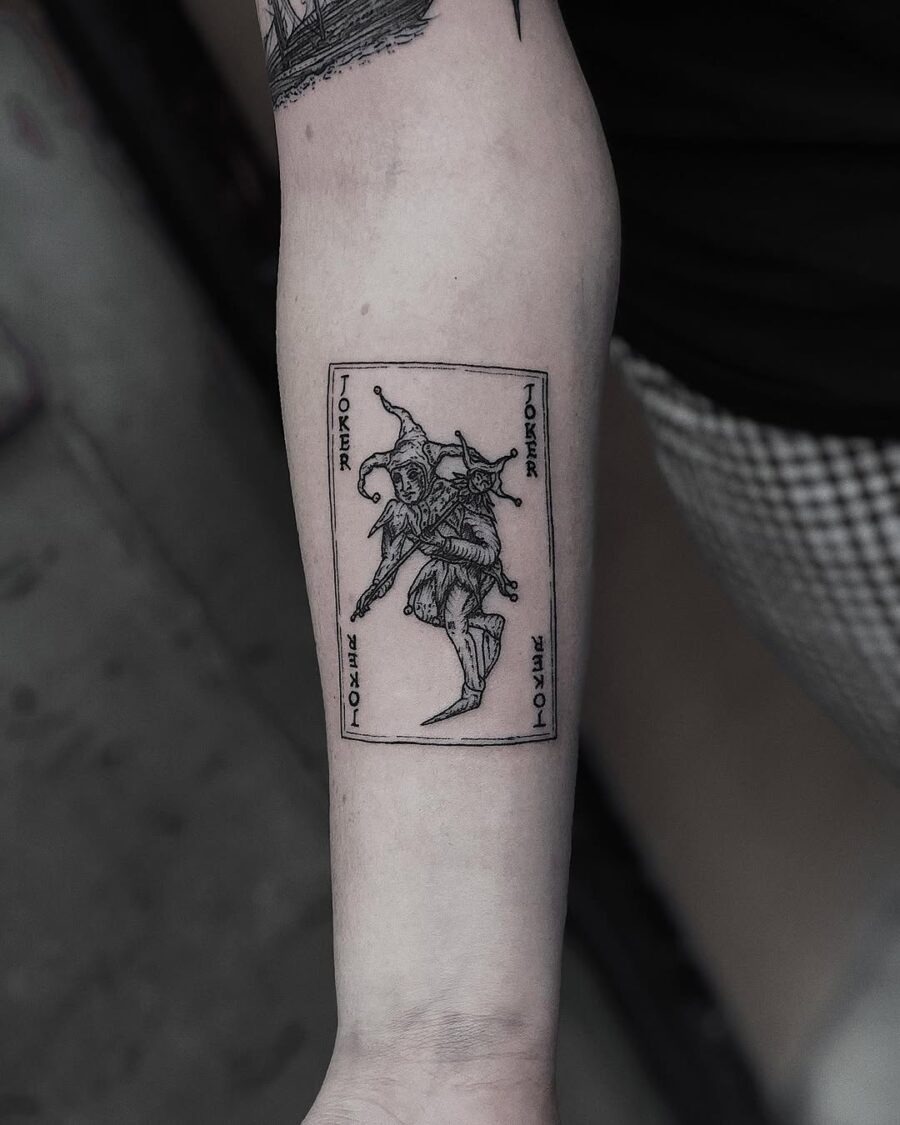Intricate joker playing card tattoo design Tattoo Design