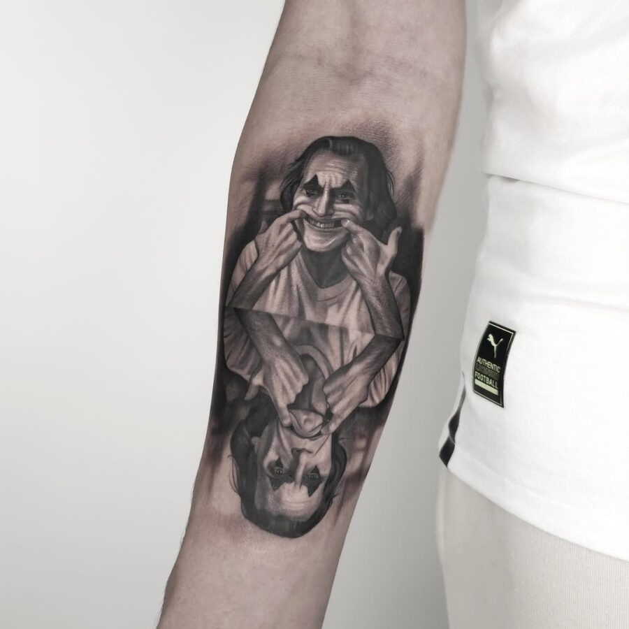 Intricate Joker Portrait with Mirror Effect Tattoo Design