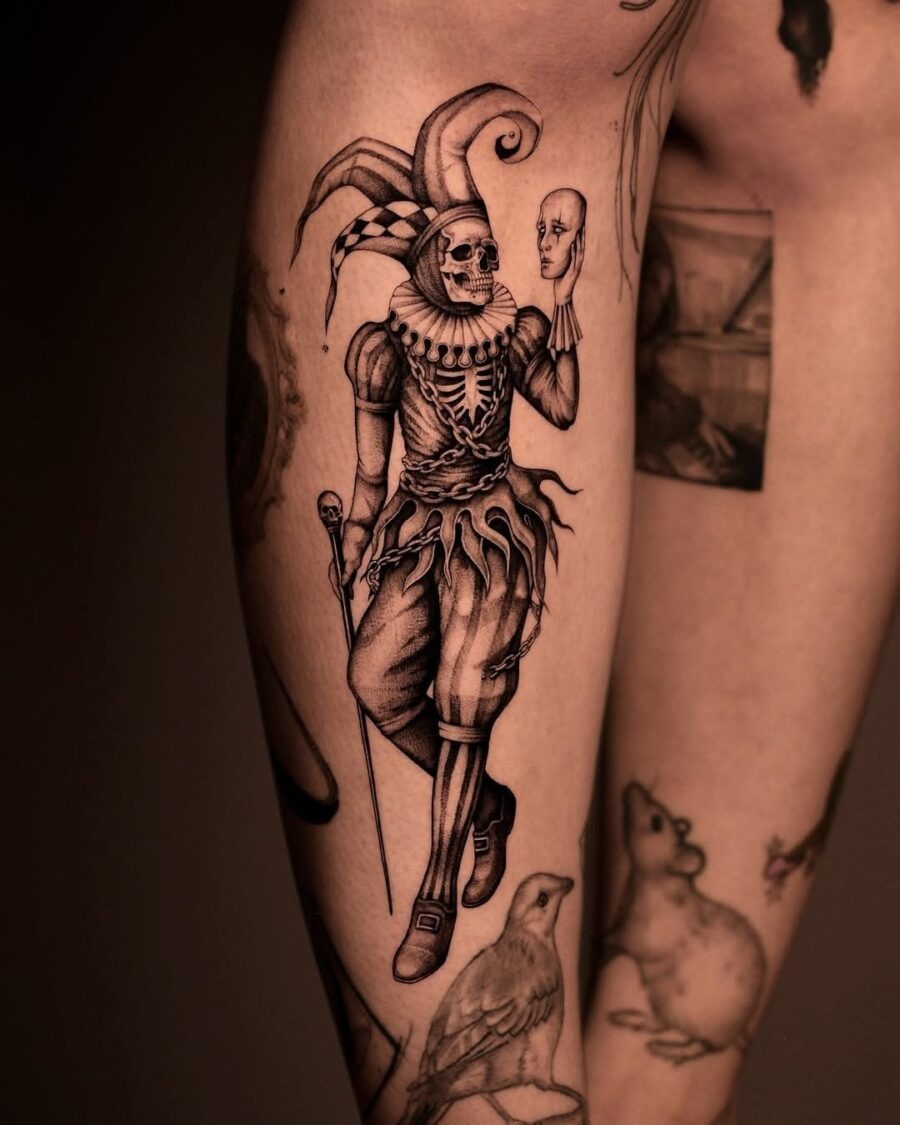 Intricate skeleton clown tattoo design on leg Tattoo Design