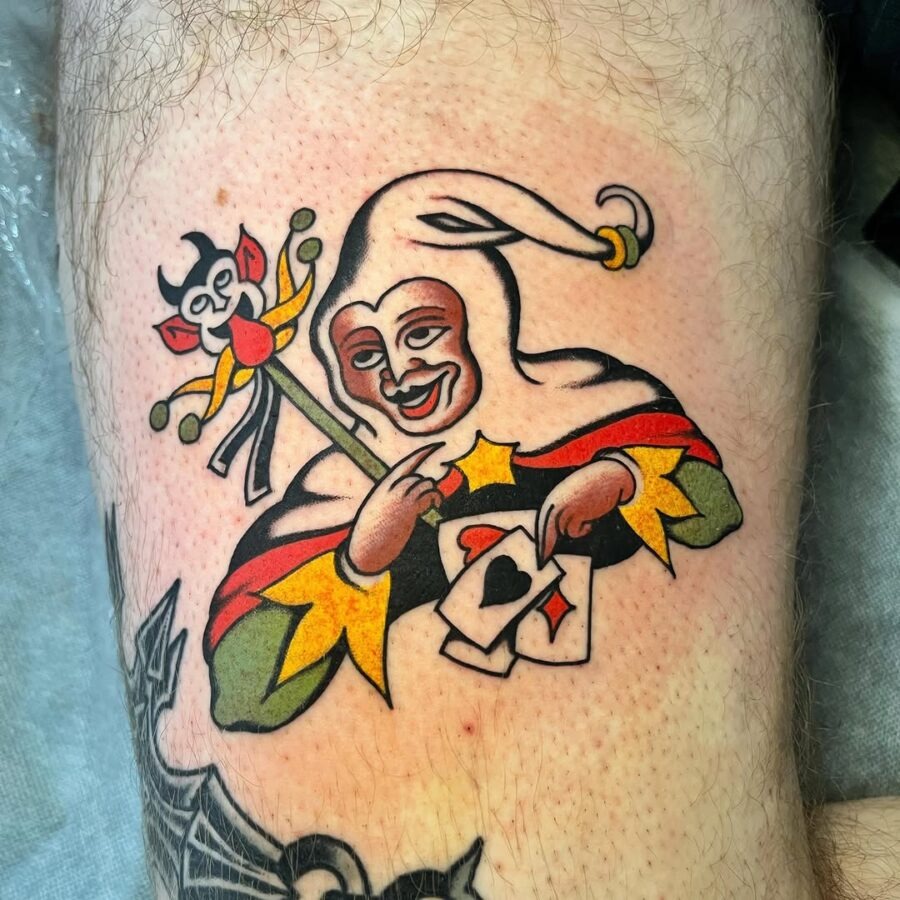 Vibrant Joker Tattoo with Jester Elements Tattoo Design