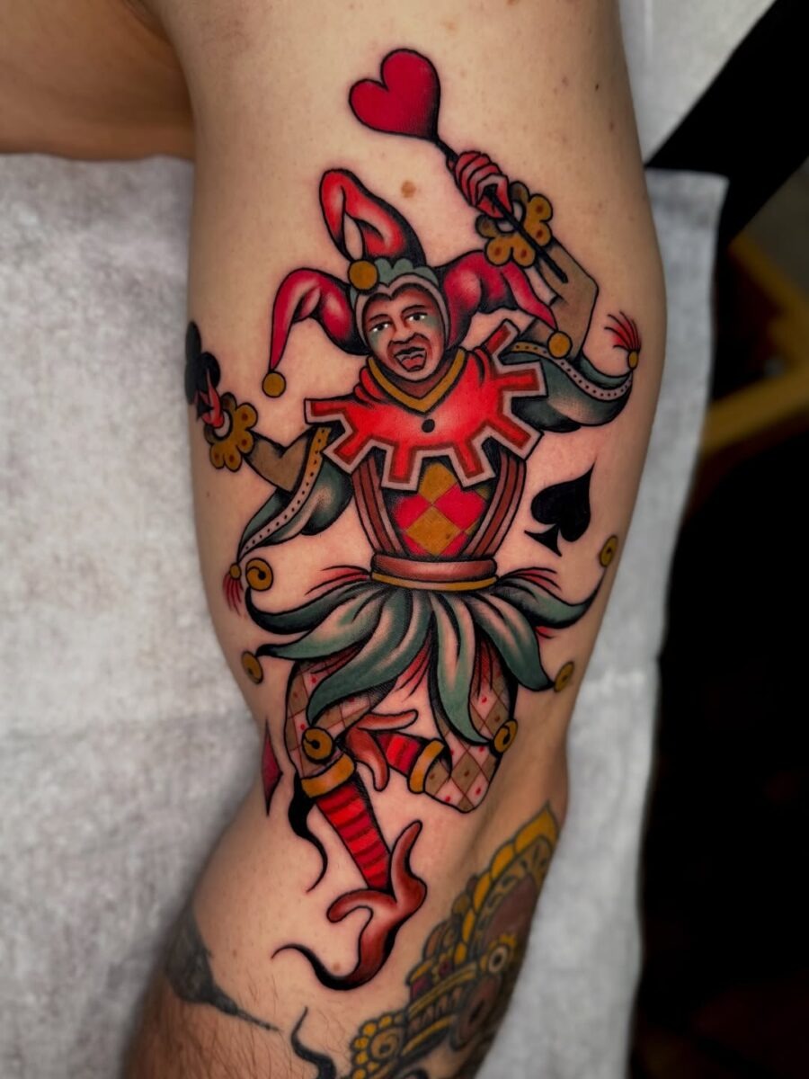 Vibrant Joker Tattoo with Playful Elements Tattoo Design