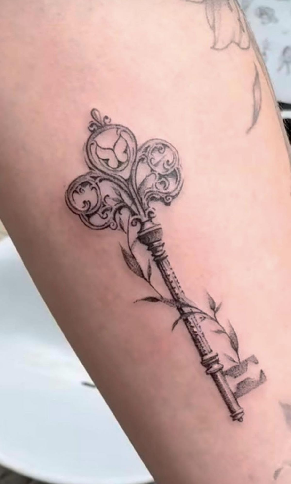 Ornamental Vintage Key with Vines Tattoo Design
