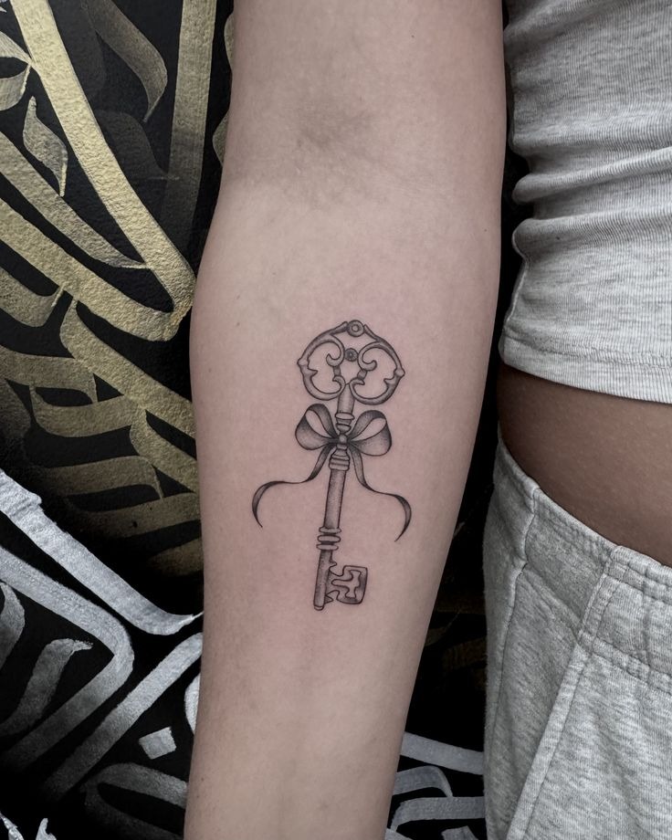 Ribbon-Tied Vintage Key Tattoo Design