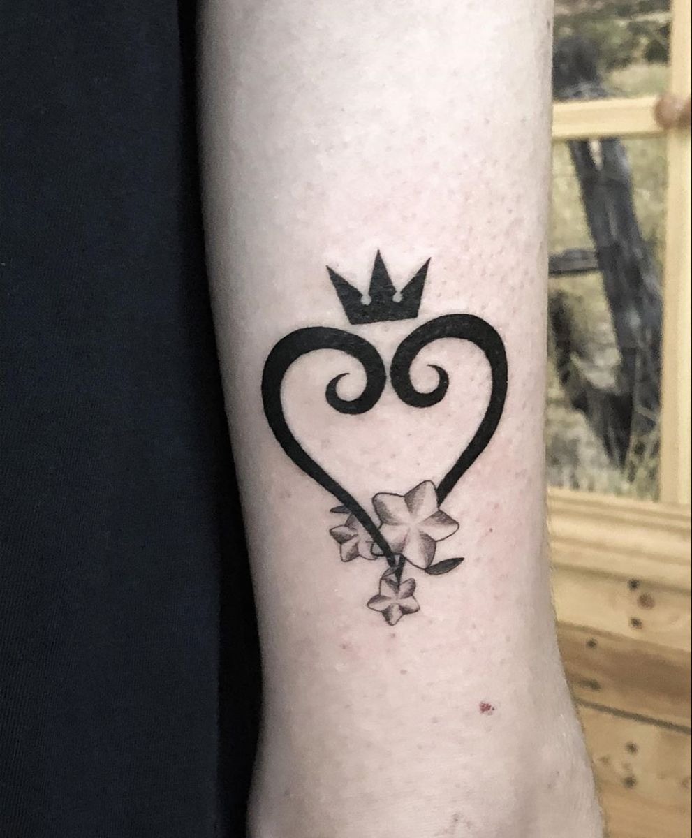 Crowned Heart With Soft Florals Tattoo Design