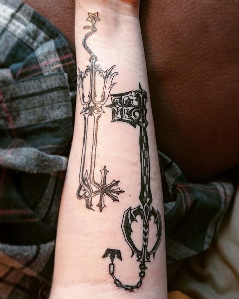 Dual Keyblades Along the Inner Forearm Tattoo Design