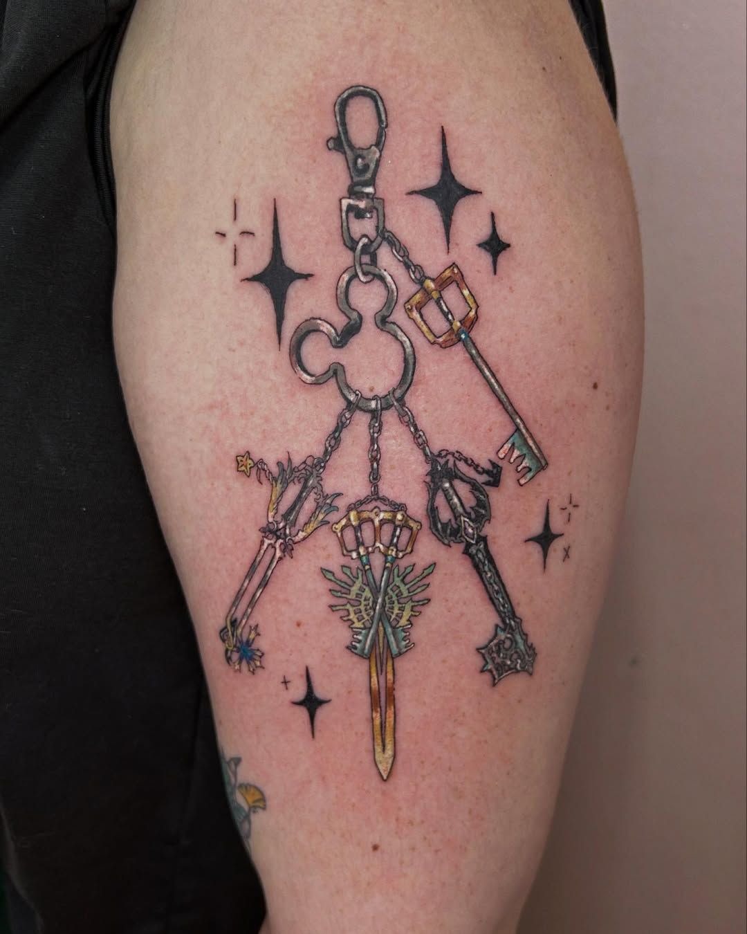 Keyblade Charm Cluster on the Thigh Tattoo Design
