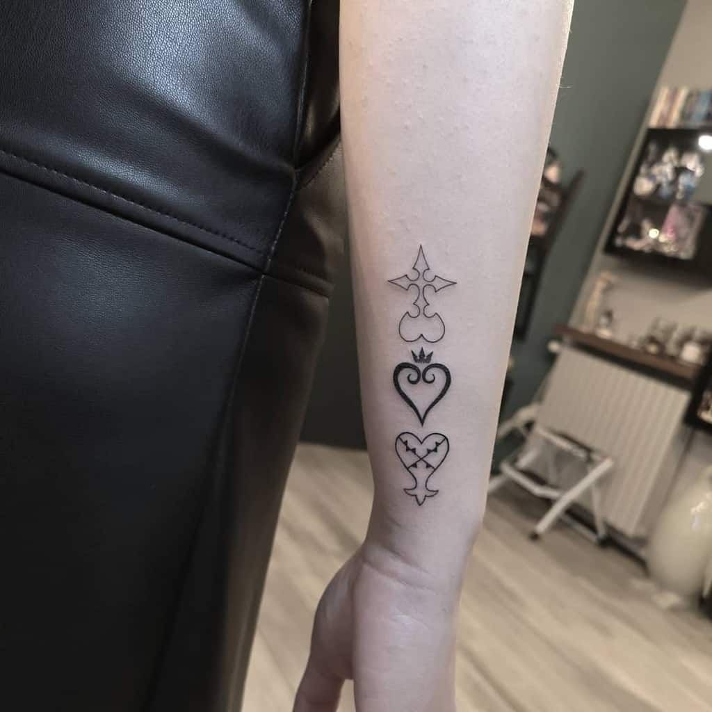 Minimalist Kingdom Hearts Symbol Stack Tattoo Design