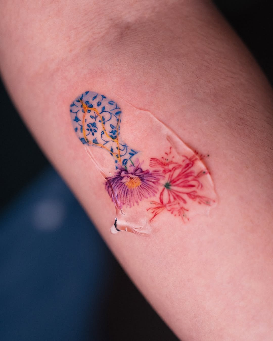 A vibrant blend of floral kintsugi art. Tattoo Design