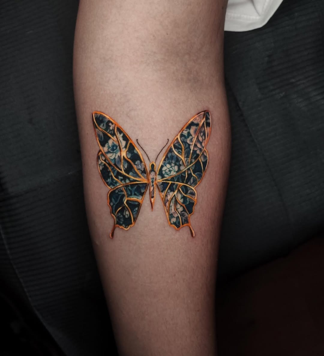 Artfully Broken: The Butterfly Tattoo Elegance Tattoo Design