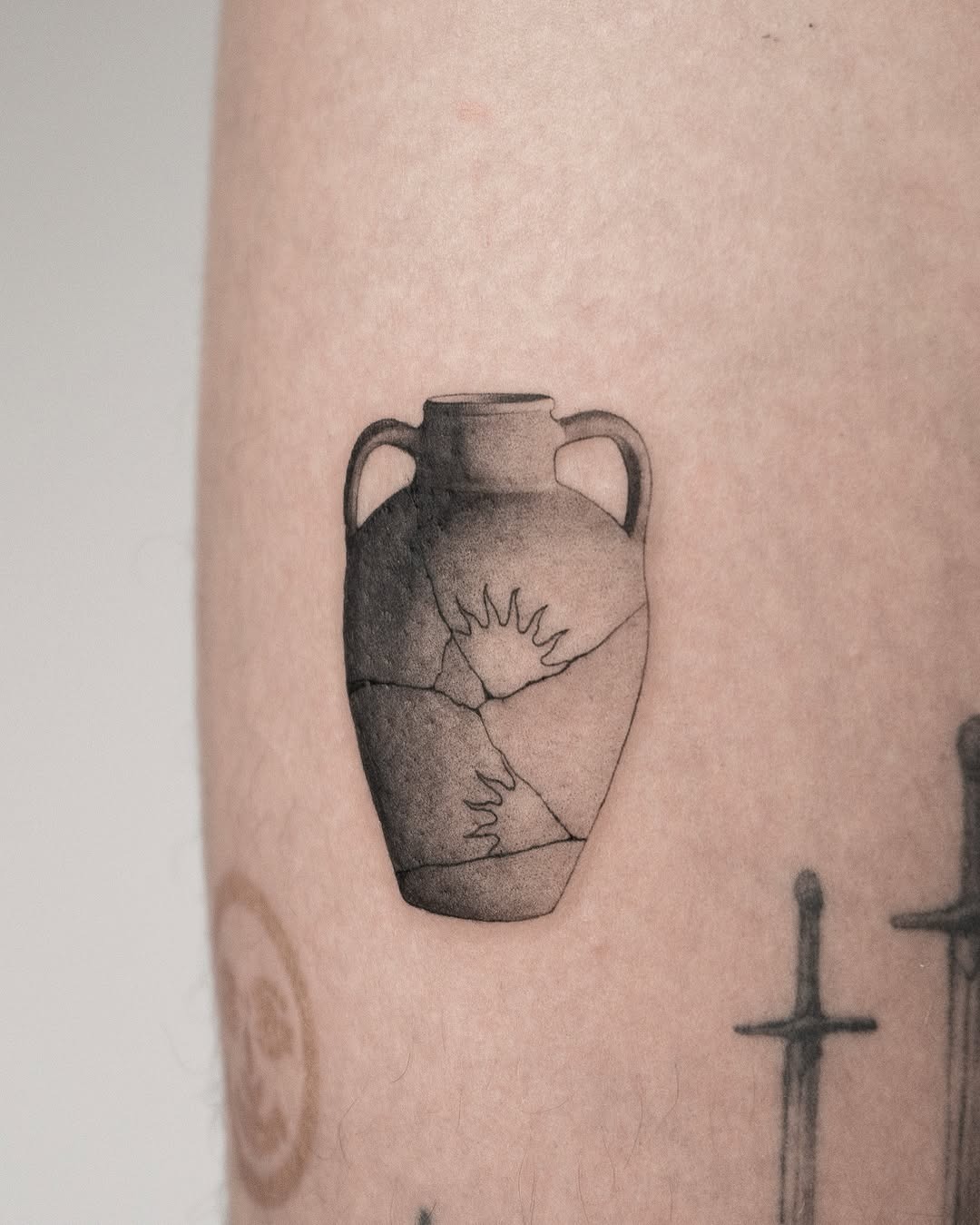 Artfully mended vase tattoo symbolizing resilience Tattoo Design