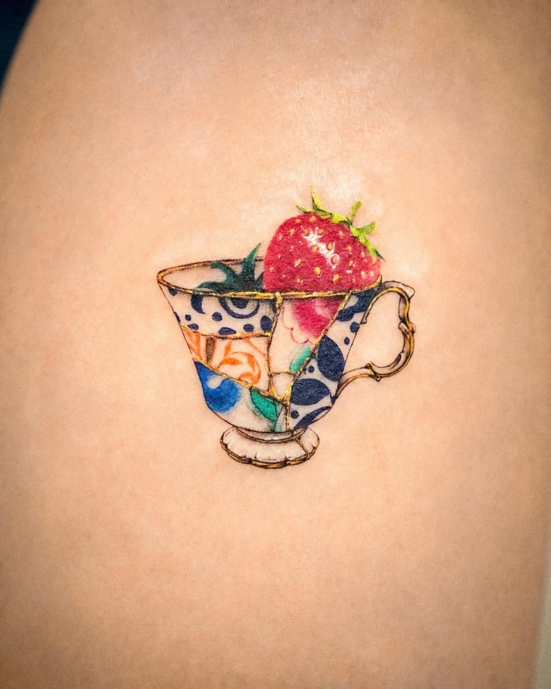 Charming Cup with Strawberry Kintsugi Tattoo Tattoo Design