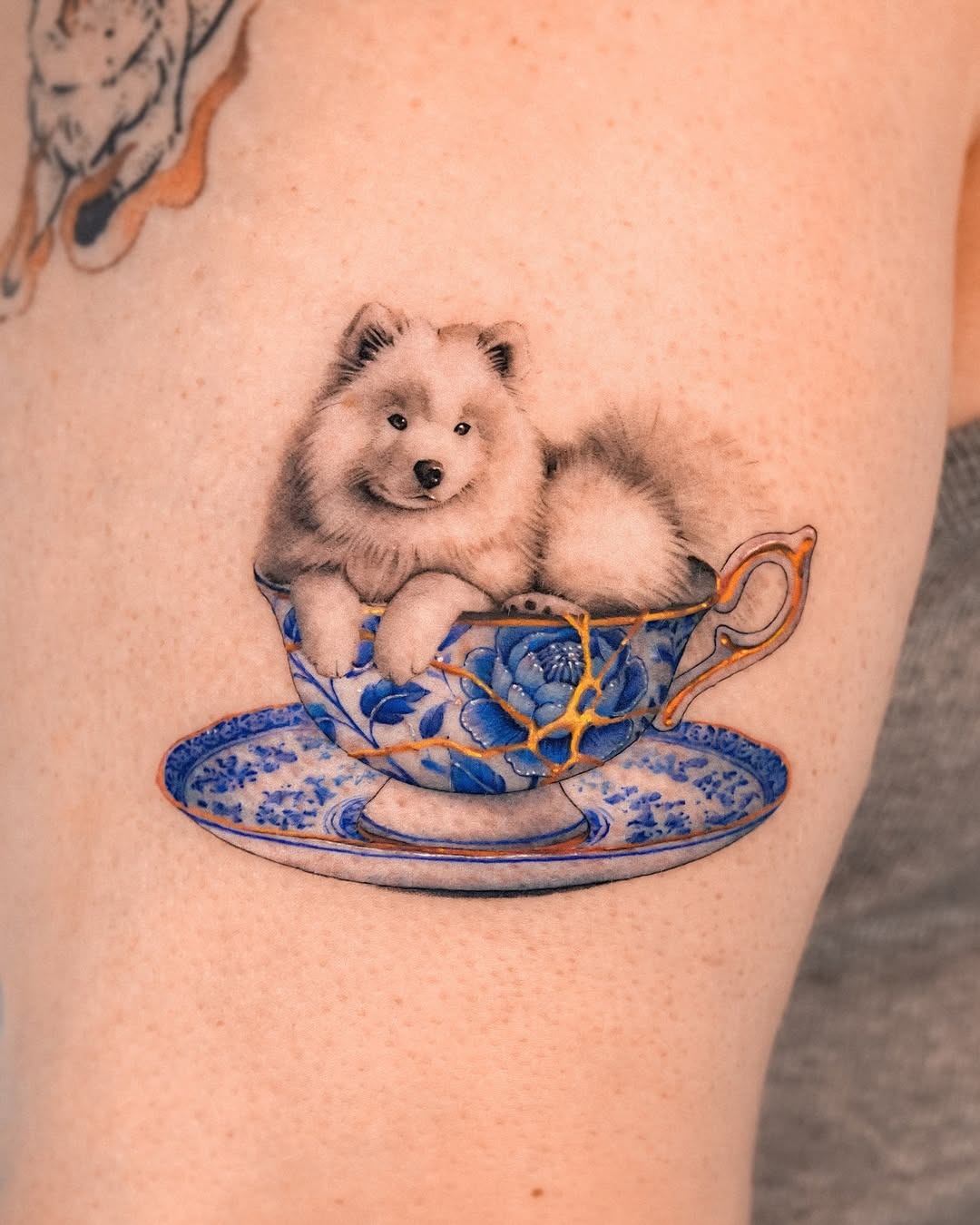 Charming samoyed in a delicate teacup tattoo Tattoo Design