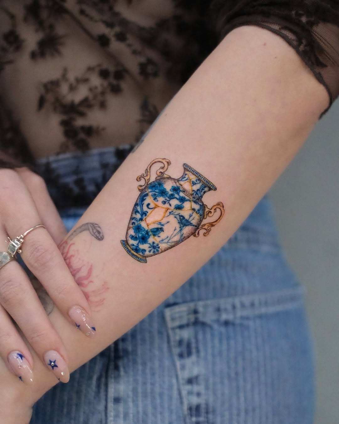 Delicate vase tattoo with intricate details Tattoo Design
