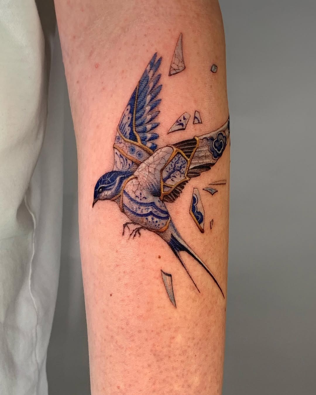 Elegant bird tattoo with kintsugi style Tattoo Design