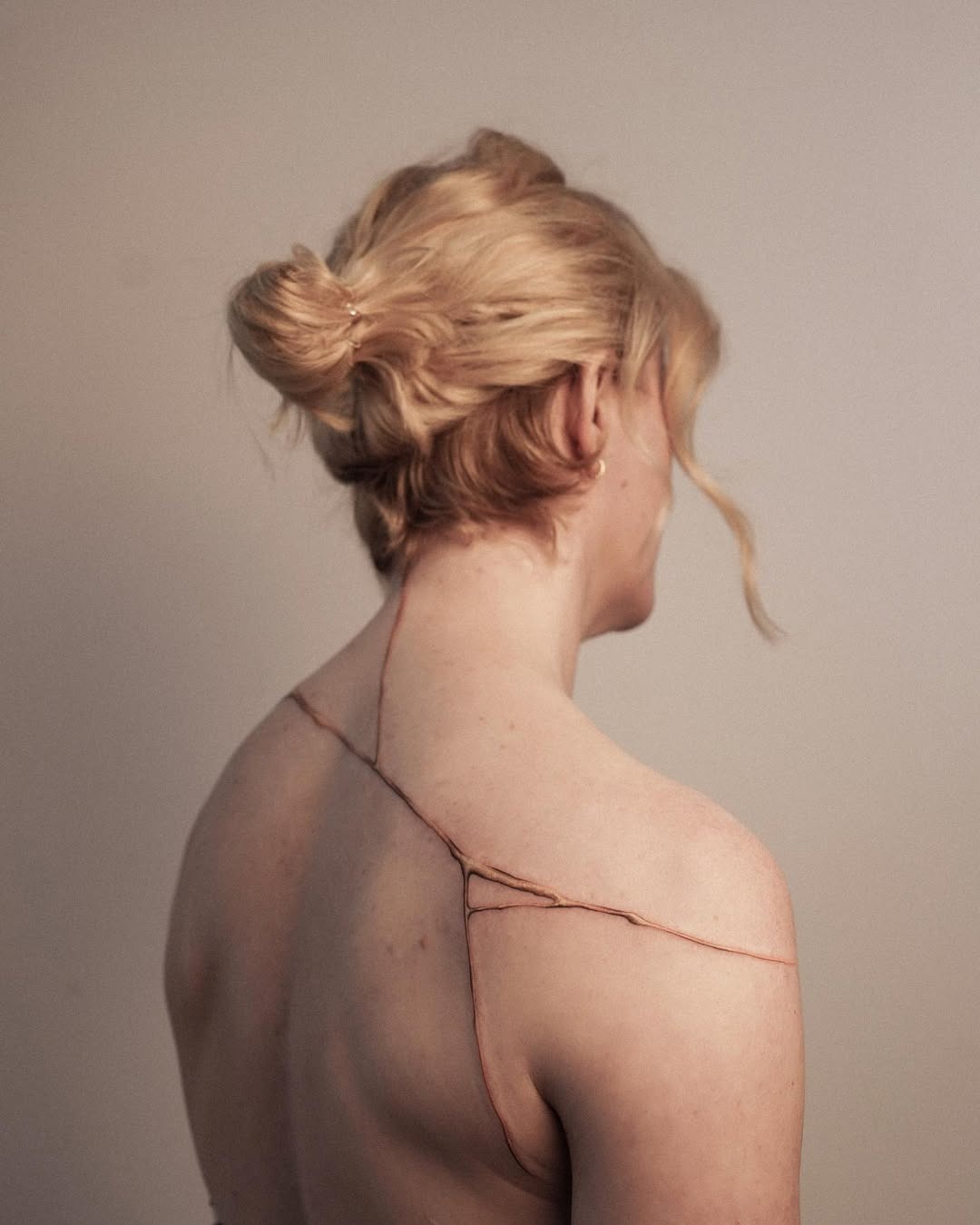 Embracing Beauty in Imperfection with Kintsugi Tattoo Design
