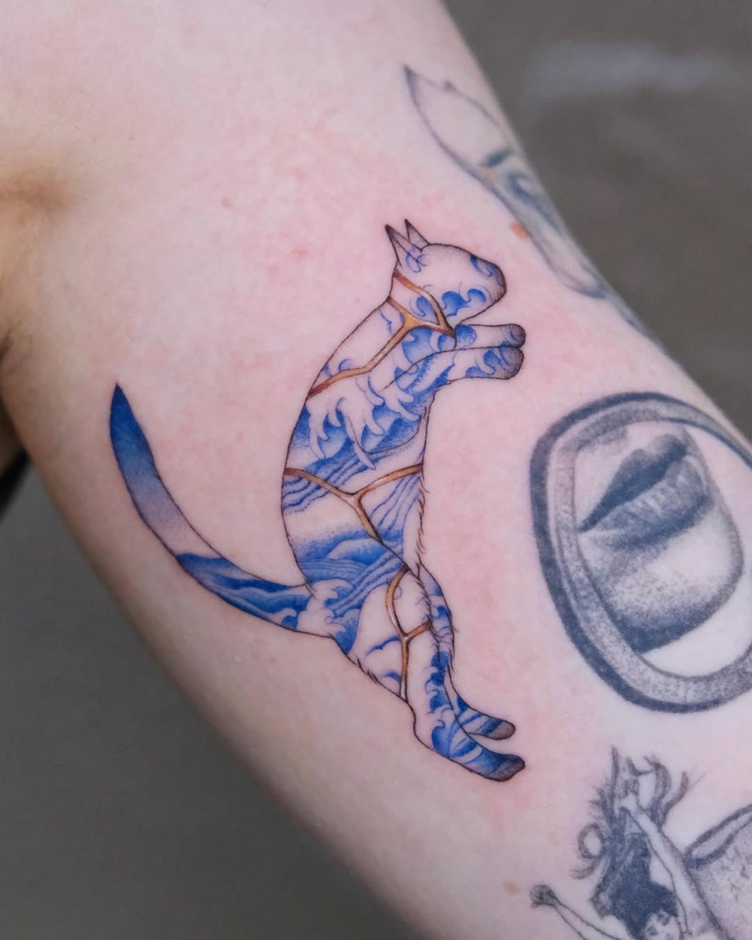 Intricate cat tattoo symbolizing resilience and beauty Tattoo Design