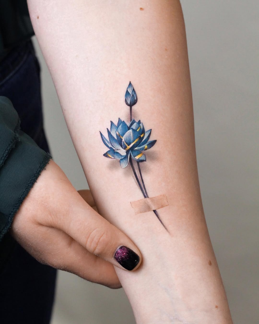 Serene lotus tattoo symbolizes strength and beauty. Tattoo Design