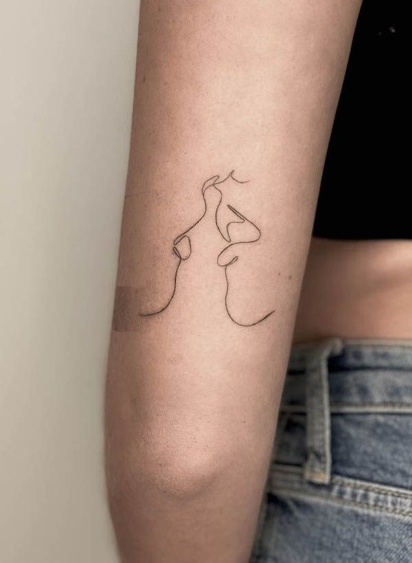 Abstract Continuous Line Kiss Design Tattoo Design