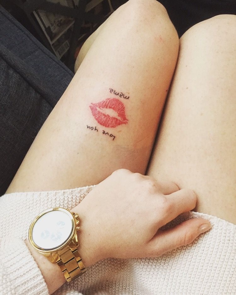 Script and Kiss Tattoo on Thigh Tattoo Design