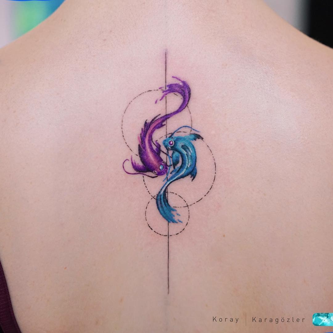 Blue and Purple Fish Swimming into Each Other Tattoo Design