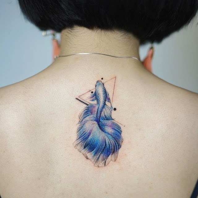 Blue Fish with Abundant Tail Fin Tattoo Design