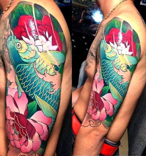 Blue Koi Fish Swimming Upstream with Lotus Koi Fish Tattoos Tattoo Design
