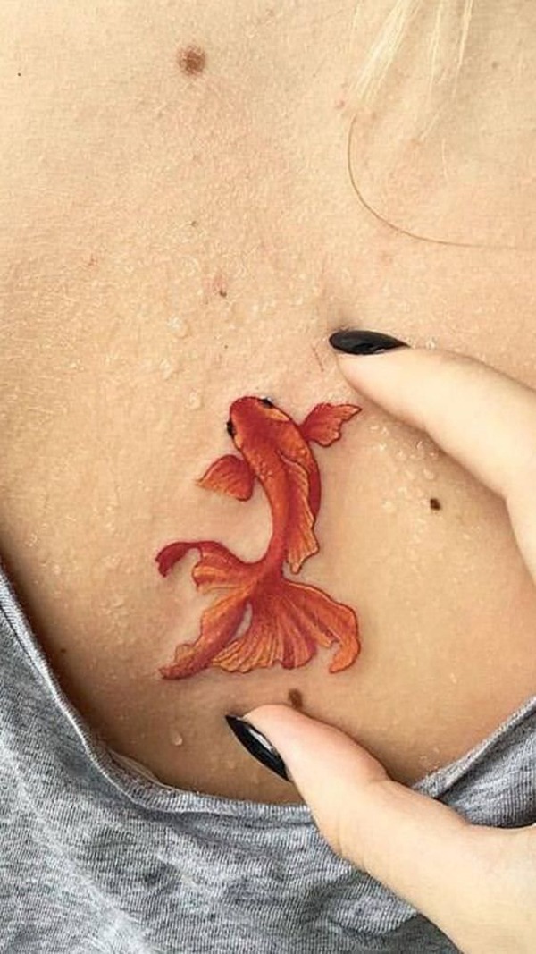 Tiny Orange Goldfish from Above Tattoo Design