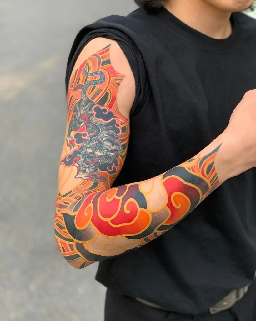 Bold Colors and Dynamic Patterns: A Modern Take on Tradition Tattoo Design