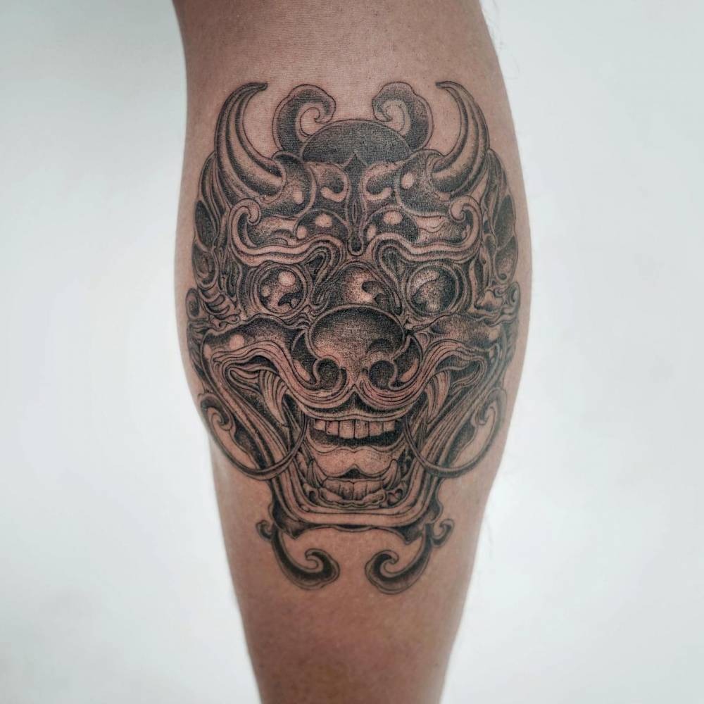Fierce Guardian Spirit: A Bold Calf Tattoo Tattoo Design