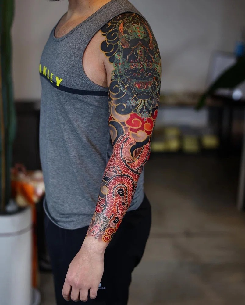 Full Sleeve Tattoo: A Masterpiece of Color and Tradition Tattoo Design
